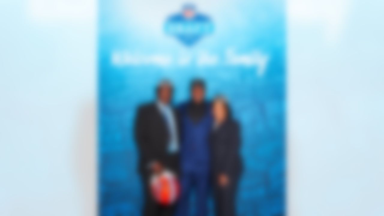 Florida safety Keanu Neal poses for a photo with his family after being selected by the Atlanta Falcons during the 2016 NFL Draft at the Auditorium Theatre in Chicago. (Eric Espino/NFL)