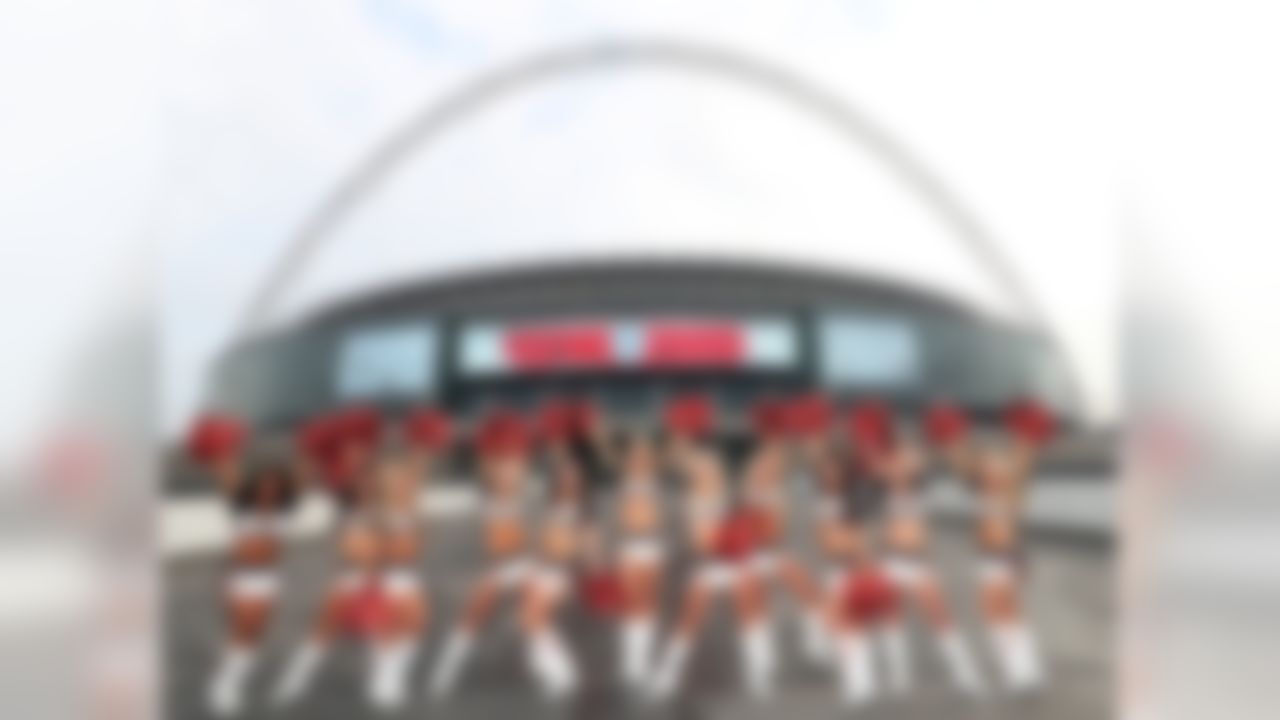 The Cincinnati Bengals cheerleaders pose for a photo in front of Wembley Stadium on Tuesday, Oct. 25, 2016 in anticipation of the NFL football game against the Washington Redskins in London. (Dave Shopland/NFL)