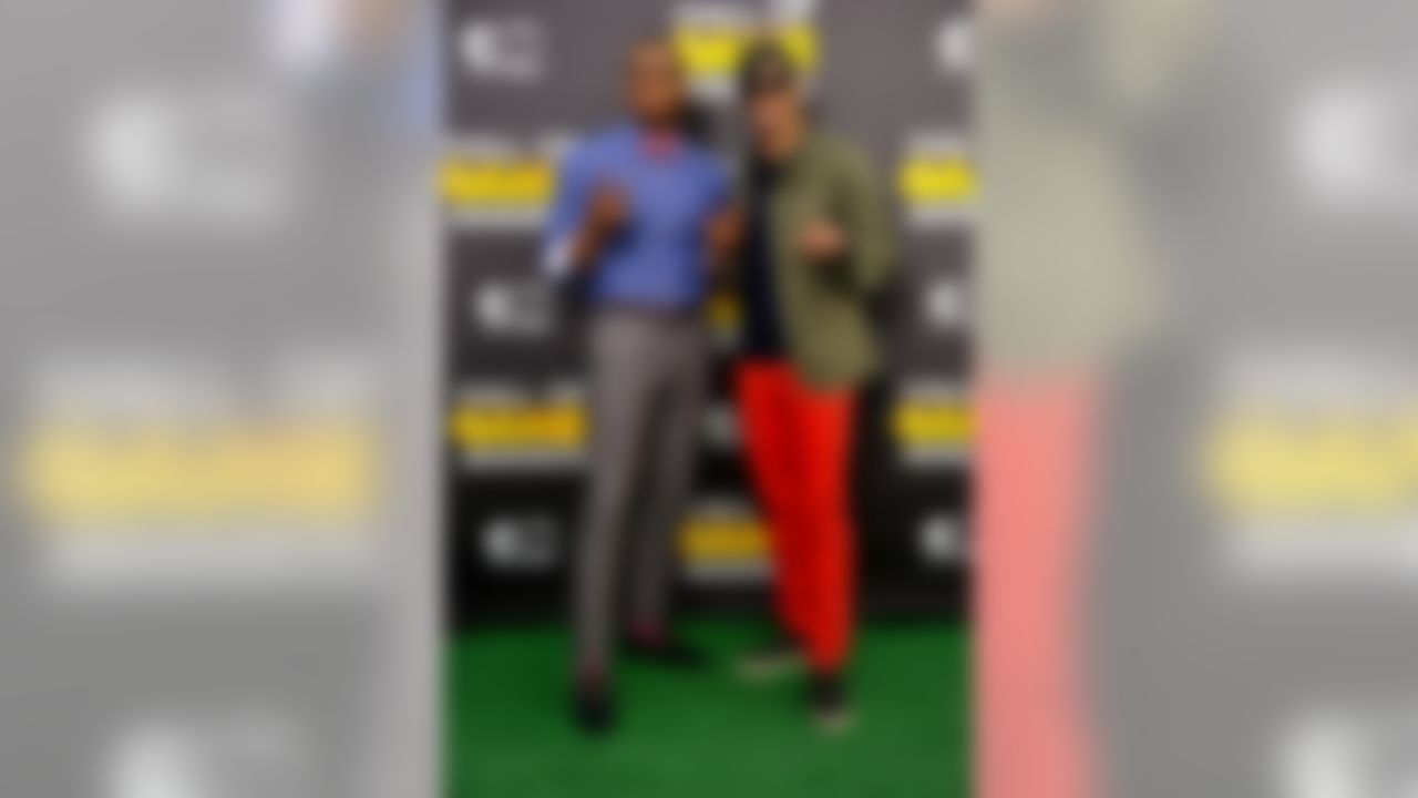 Cam Newton, left, and Colin Kaepernick arrive at the 4th Annual Hall of Games Awards on Saturday, Feb, 15, 2014, in Santa Monica, Calif. (Photo by Richard Shotwell/Invision/AP)