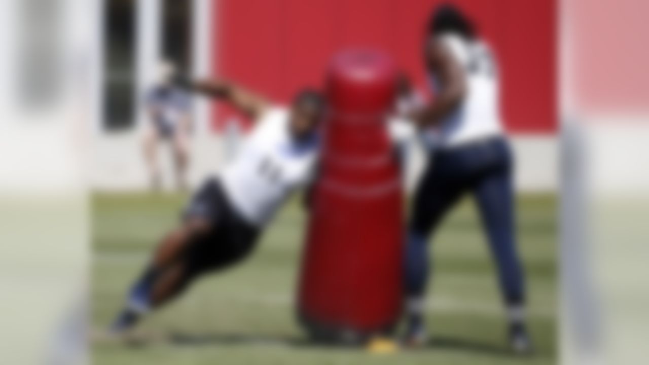 Defensive end Michael Sam, from Missouri, moves around a pylon during the NFL Super Regional Combine football workout, Sunday, March 22, 2015 in Tempe, Ariz. (AP Photo/Rick Scuteri)