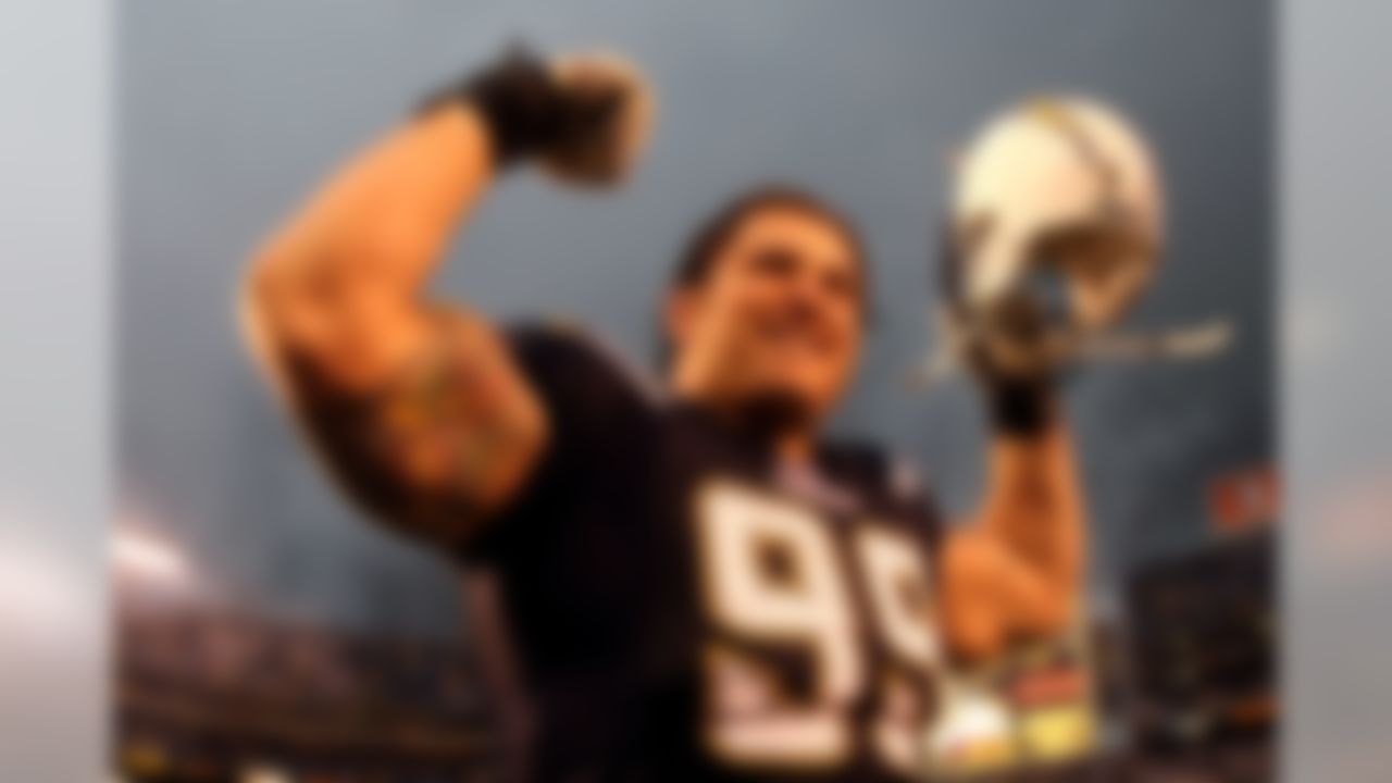 SAN DIEGO - JANUARY 06: Igor Olshansky #99 of the San Diego Chargers walks off the field after his team's 17-6 victory over the Tennessee Titans during their AFC Wild Card Game on January 6, 2008 at Qualcomm Stadium in San Diego, California. (Photo by Donald Miralle/Getty Images)