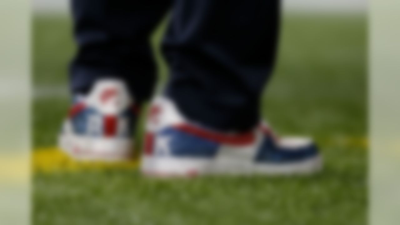 New England Patriots owner Robert Kraft wears custom shoes during an NFL football game against the New York Jets against the New England Patriots at Gillette Stadium on Thursday October 16, 2014 in Foxborough, Massachusetts. (Aaron M. Sprecher/NFL)