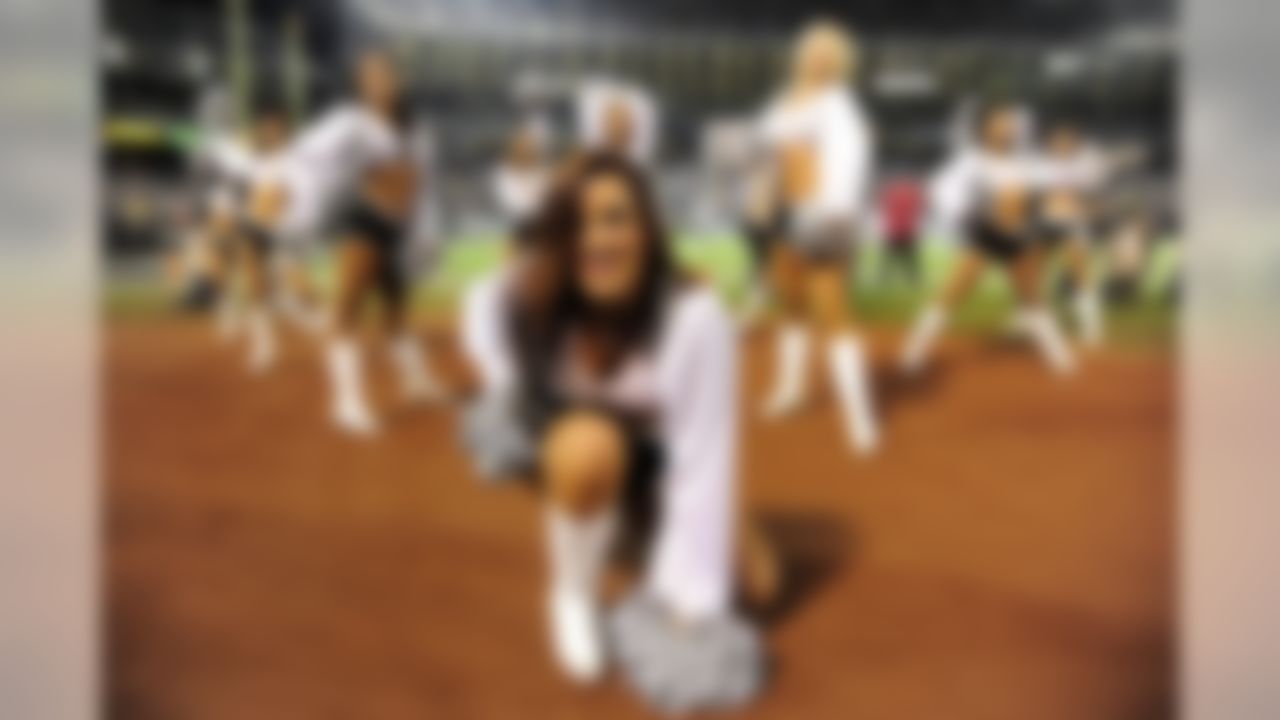 Oakland Raiders cheerleaders perform during the second quarter against the Denver Broncos at O.co Coliseum. The Broncos defeated the Raiders 26-13. (Kyle Terada/US Presswire)