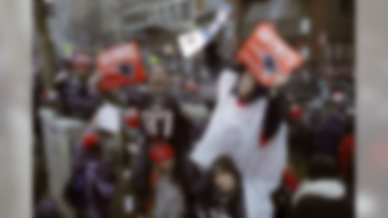 New England Patriots fans wait for the start of a parade Tuesday, Feb. 7, 2017, in Boston to celebrate their team's 34-28 win over the Atlanta Falcons in Sunday's NFL Super Bowl 51 football game in Houston. (AP Photo/Charles Krupa)