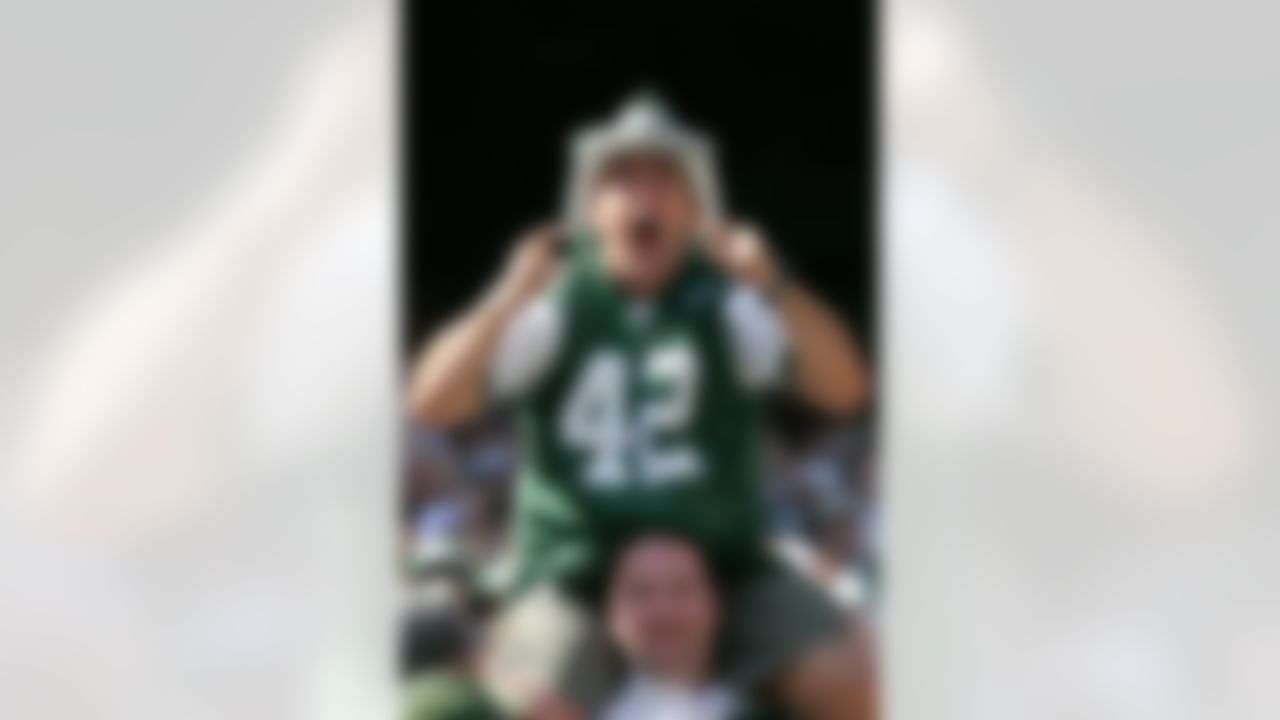 EAST RUTHERFORD,NJ - SEPTEMBER 12: Fireman Ed in the stands at The Meadowlands on September 12, 2004 in East Rutherford, New Jersey. The Jets beat the Bengals 31-24. (AP Photo/David Drapkin)