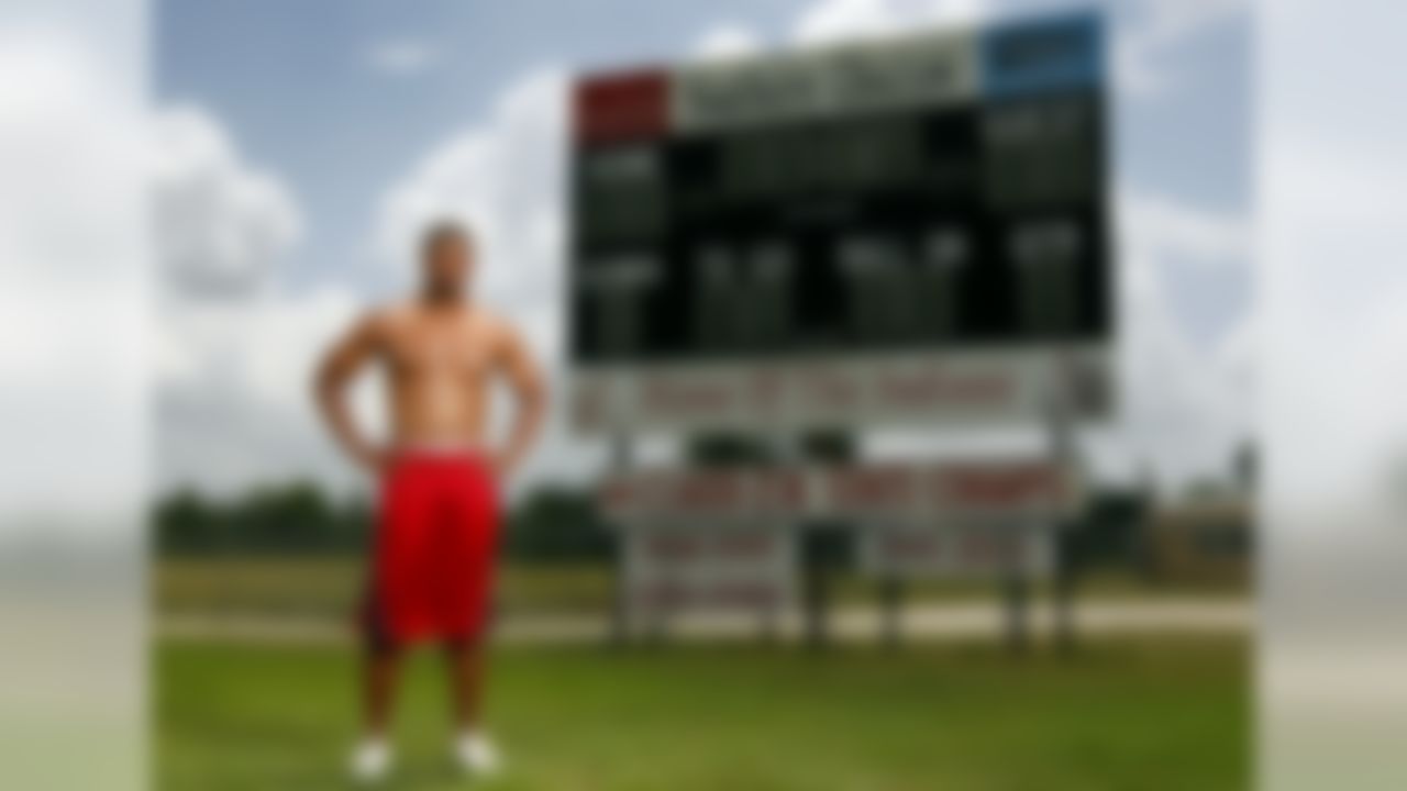 Gary Banks of the San Diego Chargers poses in front of the scoreboard from his high school in Gilbertown, Ala. where he was a member of the 1999 and 2000 Class 2A state champion teams at Southern Choctaw. (Ben Liebenberg/NFL)» On The Fringe: Follow the players