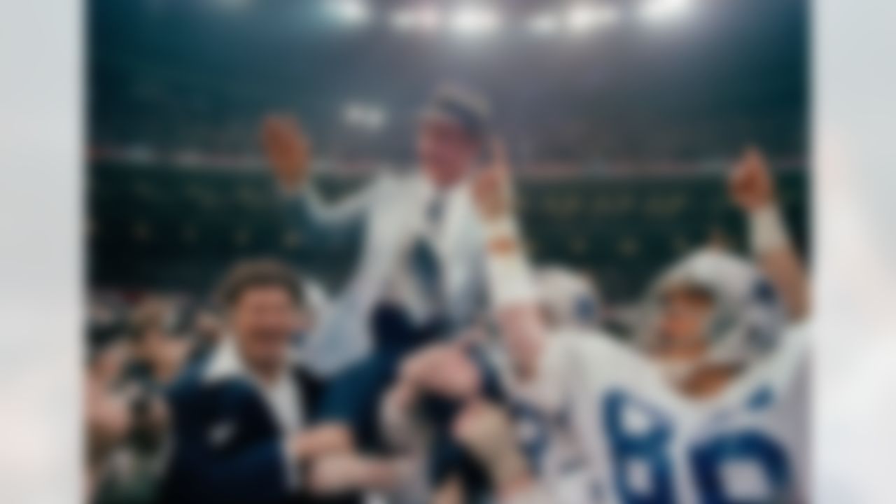 Dallas Cowboys head coach Tom Landry is carried off the field after helping his team defeat the Denver Broncos in Super Bowl XII, on January 15, 1978, in New Orleans. (Associated Press)