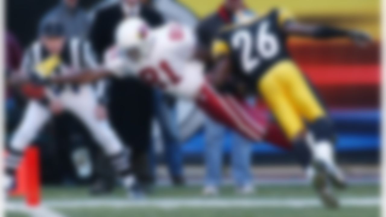 Arizona Cardinals wide receiver Anquan Boldin (81) stretches the ball into the end zone for a touchdown as Pittsburgh Steelers cornerback Deshea Townsend (26) defends in the third quarter of the Steelers' 28-15 win in Pittsburgh, Sunday, Nov. 9, 2003. (AP Photo/Keith Srakocic)