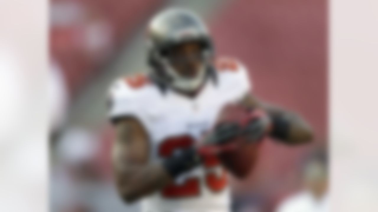 Tampa Bay Buccaneers defensive back Aqib Talib (25) catches the ball before an NFL preseason football game against the New England Patriots Friday, Aug. 24, 2012, in Tampa, Fla. (AP Photo/Chris O'Meara)