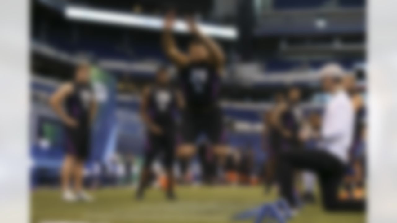 TCU offensive lineman Joe Noteboom participates in the broad jump during the 2018 NFL Scouting Combine on Friday, March 2, 2018 in Indianapolis.