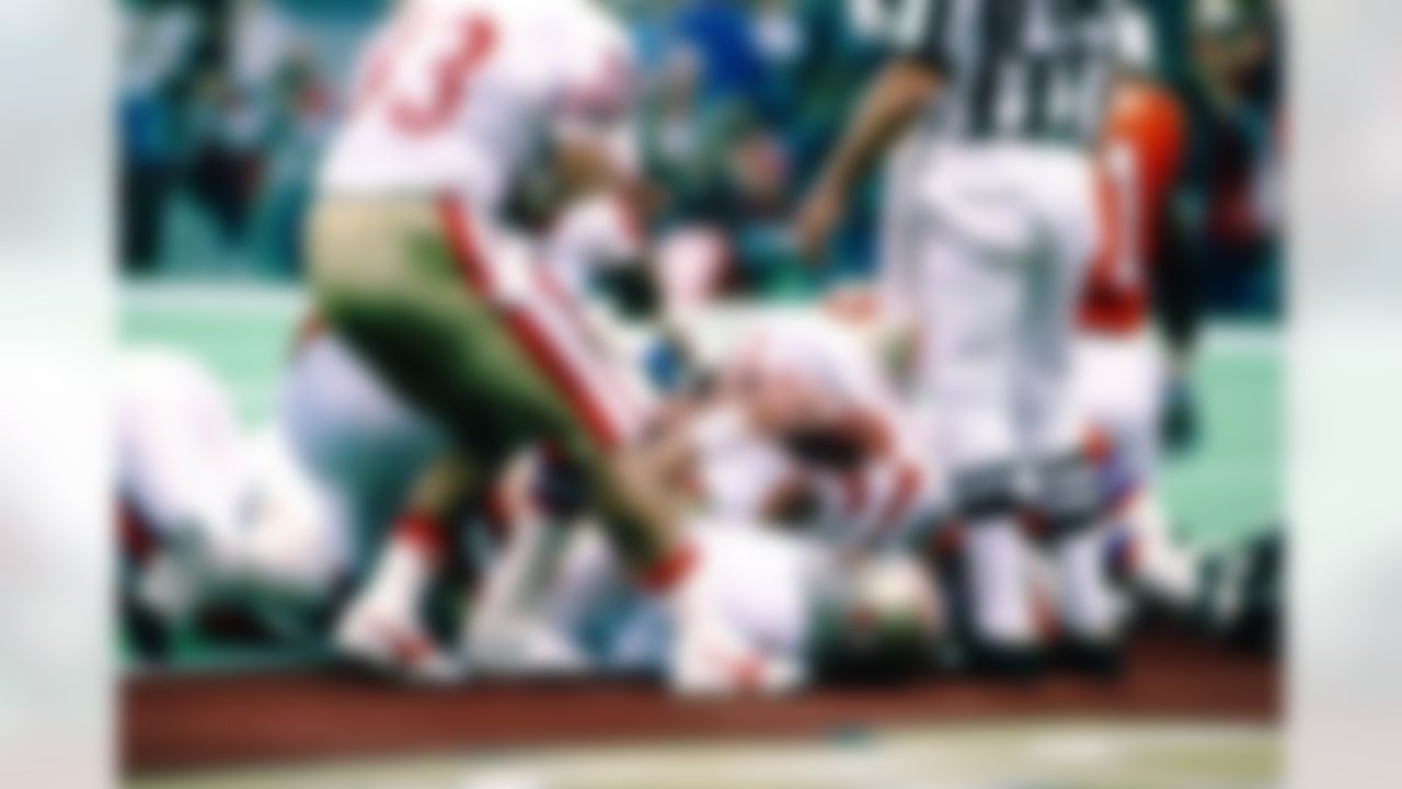San Francisco 49ers fullback Tom Rathman (44) lies in the end zone after scoring on a 3-yard run during a Super Bowl XXIV NFL game against the Denver Broncos in New Orleans, on January 28, 1990. The 49ers defeated the Broncos 55-10. (AP Photo/Eric Lars Bakke)