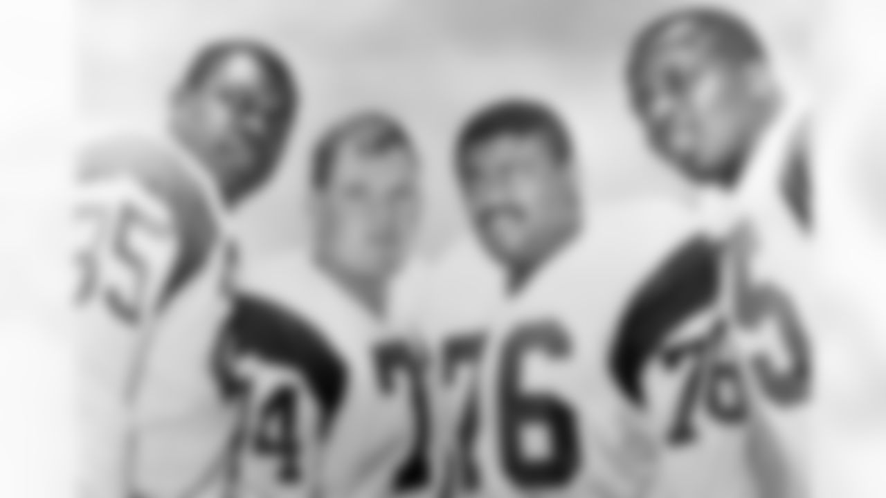 Los Angeles Rams defensive front four, known as the "Fearsome Foursome." from left to right are Lamar Lundy (85), Merlin Olsen (74), Rosey Grier (76), and Deacon Jones (75). Olsen, a Pro Football Hall of Famer and former television actor, died Wednesday night, March 10, 2010, at a Los Angeles hospital. He was 69. (AP Photo/NFL Photos)