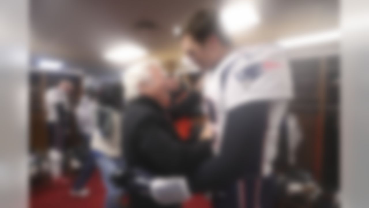 New England Patriots owner Robert Kraft celebrates with quarterback Tom Brady (12) following the NFL AFC Championship football game against the Kansas City Chiefs, Sunday, Jan. 20, 2019 in Kansas City, Mo.