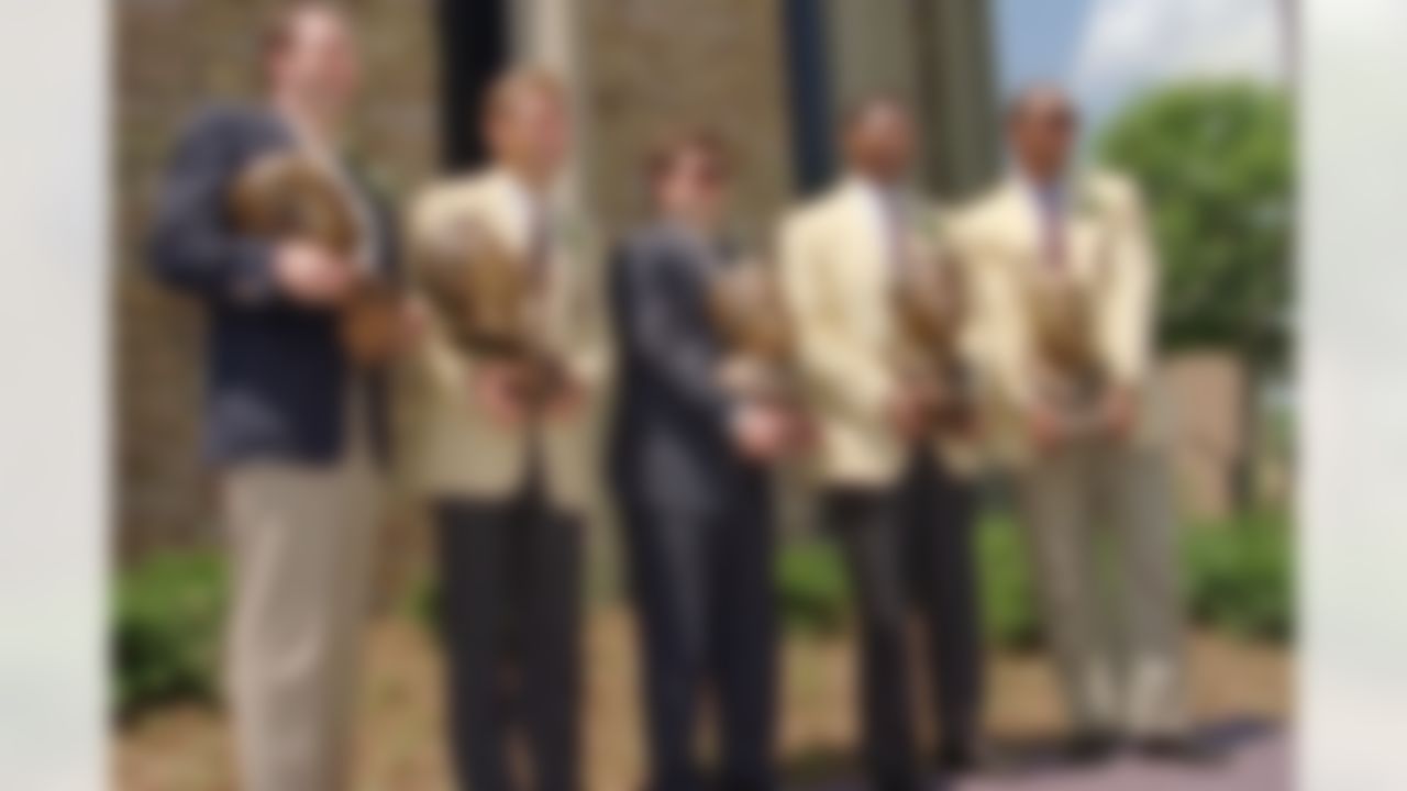 The 1995 Pro Football Hall of Fame enshrinees pose for a photograph after ceremonies on Saturday, July 29, 1995, in Canton, Ohio. They are, from left to right, Henry Jordan, Jr., Steve Largent, Jim Finks Jr., Lee Roy Selmon and Kellen Winslow. Jordan and Finks were accepting for their fathers. (AP Photo/Mark Duncan)