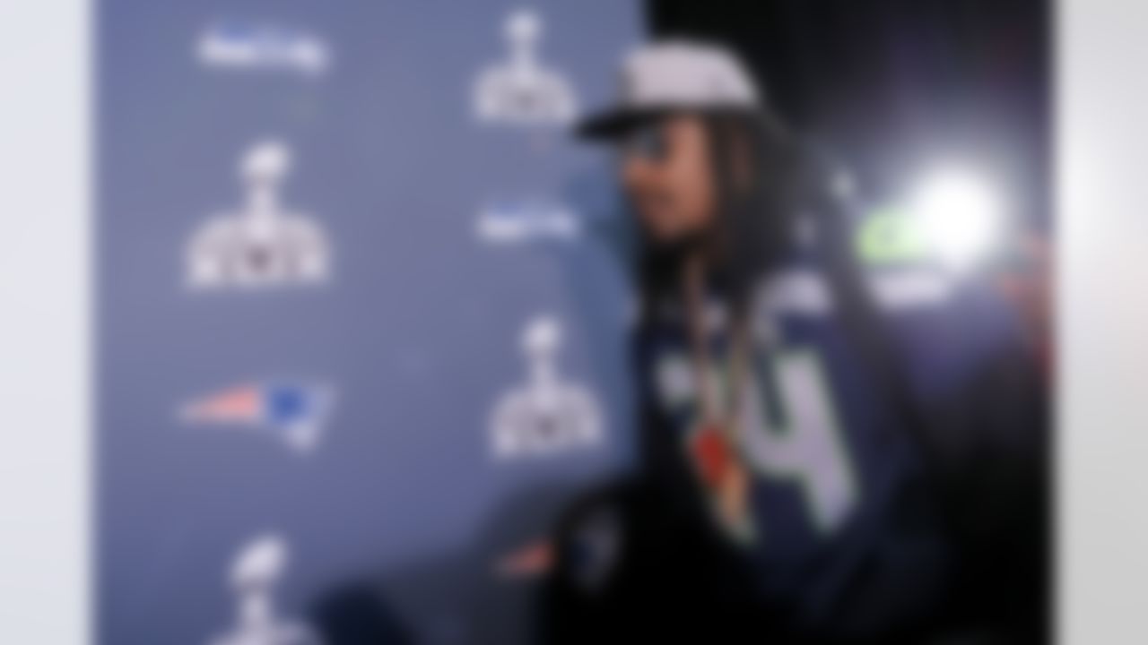 Seattle Seahawks' Marshawn Lynch arrives at a news conference for NFL Super Bowl XLIX football game, Wednesday, Jan. 28, 2015, in Phoenix. The Seahawks play the New England Patriots in Super Bowl XLIX on Sunday, Feb. 1, 2015. (AP Photo/Matt York)