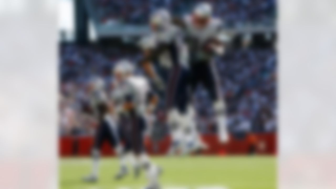 FOXBORO, MA - SEPTEMBER 23: Laurence Maroney #39 and Sammy Morris # 34 of the New England Patriots celebrate a touchdown against the Buffalo Bills at Gillette Stadium on September 23, 2007 in Foxboro, Massachusetts. (Photo by Jim Rogash/Getty Images)