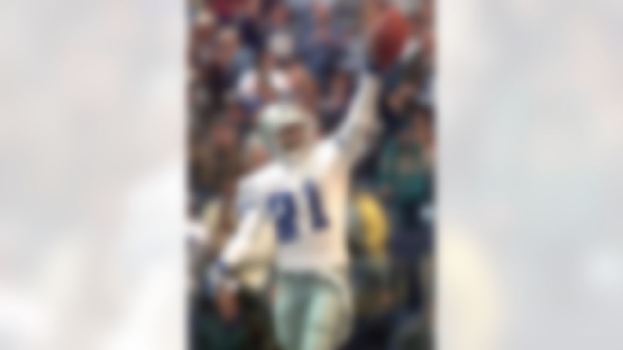 Dallas Cowboys' Deion Sanders celebrates after an interception against Miami Dolphins quarterback Dan Marino during the second quarter Thursday, Nov. 25, 1999, in Irving, Texas. (AP Photo/LM Otero)