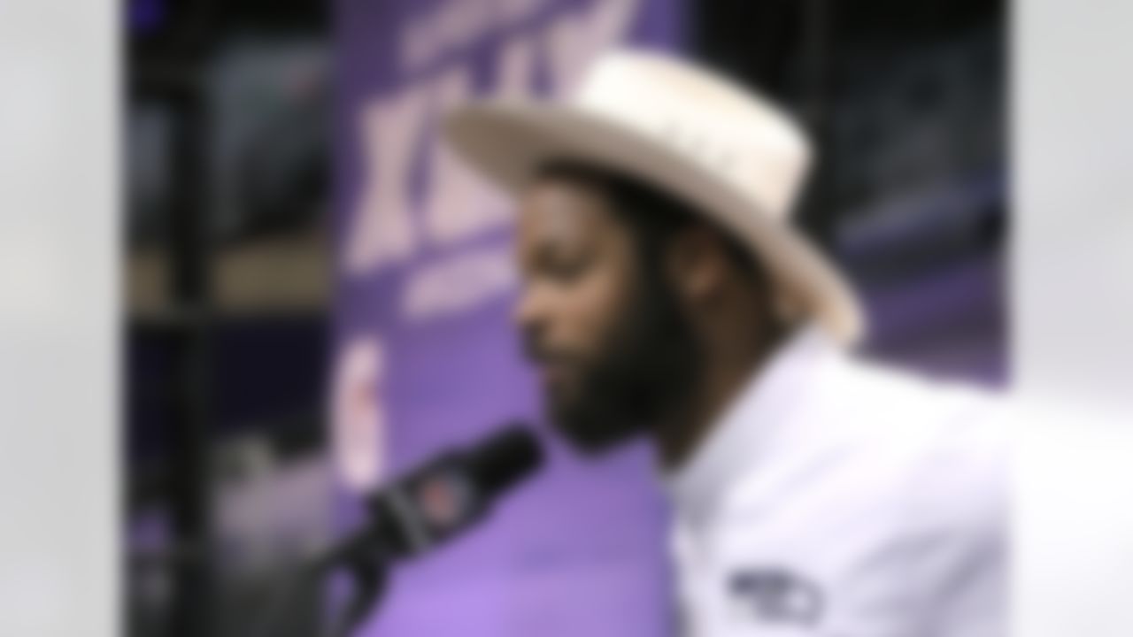 Seattle Seahawks defensive end Michael Bennett speaks during Media Day for Super Bowl XLIX at the U.S. Airways Center on Tuesday, January 27, 2015 in Phoenix, AZ. (Perry Knotts/NFL)