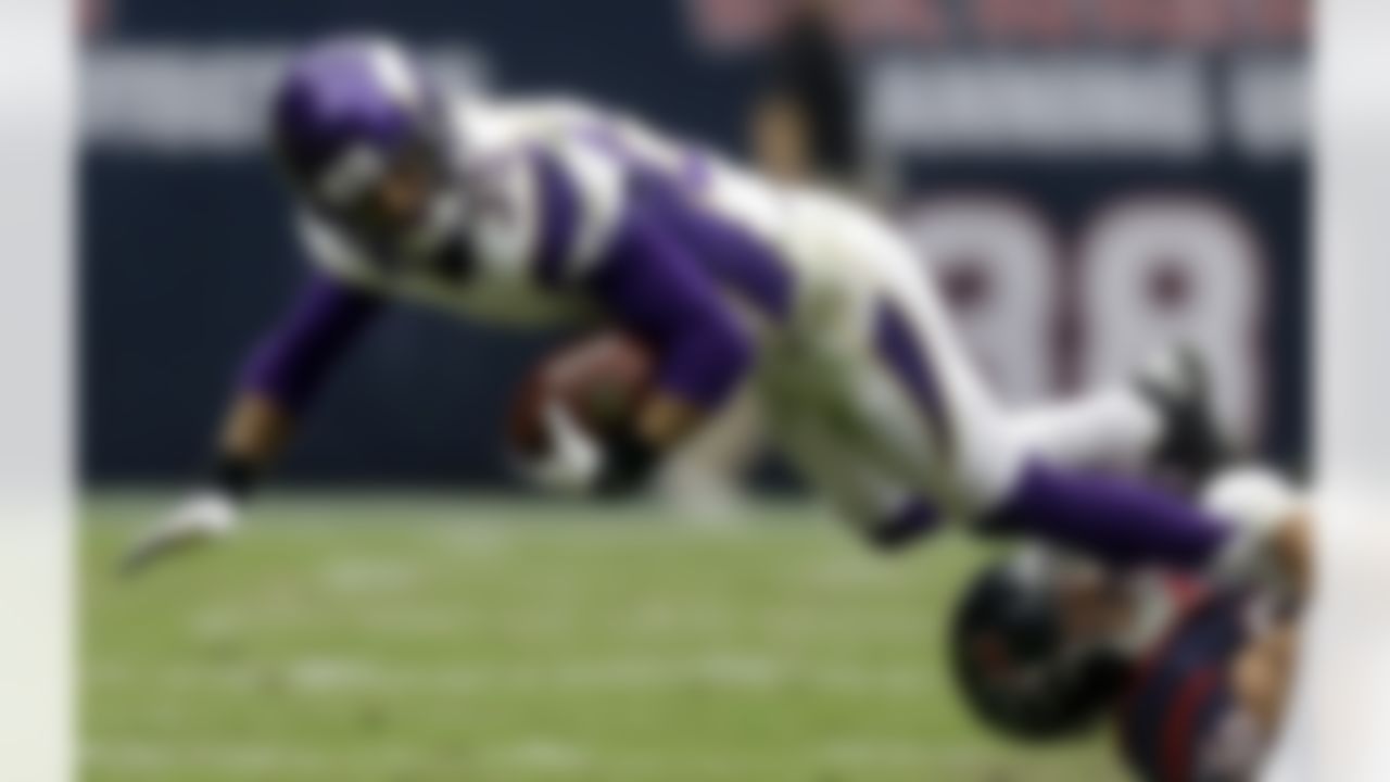 Minnesota Vikings cornerback Marcus Sherels (35) is tackled by Houston Texans' James Casey (86) during the second quarter of an NFL football game on Sunday, Dec. 23, 2012, in Houston. (AP Photo/Patric Schneider)