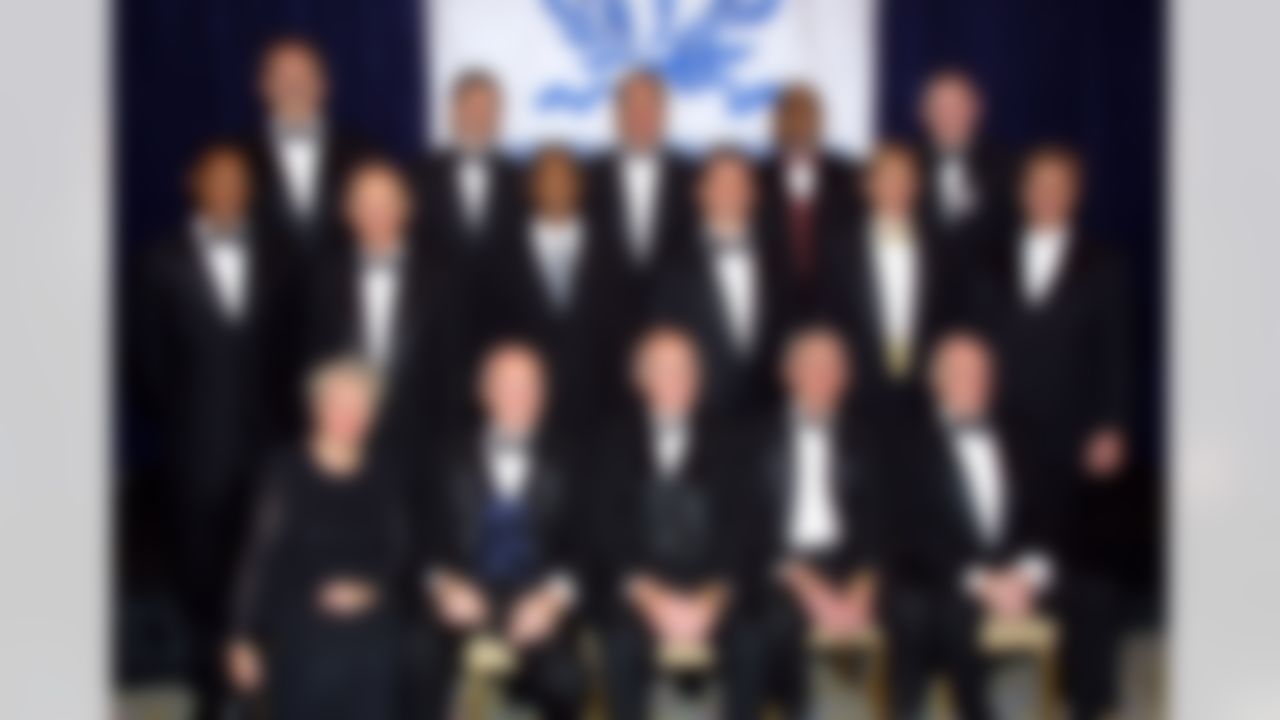 Inductees to the The National Football Foundation's 2000 College Football Hall of Fame gather in New York Tuesday, Dec. 12, 2000, for their portrait. From left to right, front row are: Margaret Talboom for her late husband Eddie; Bob Dove; Harley Sewell; Stan Jones; and Joe Schmidt. Second row: Marcus Allen; Forest Evashevski; Michael Haynes; Billy Ray Smith; Terry Hoage; and John Elway. Back row: Dan Dierdorff; Johnny Musso; Terry Donahue; Johnny Rodgers and Bob Burris representing his late brother Kurt. (AP Photo/Stuart Ramson)
