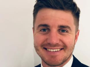 a photo of richard edmunds smiling at the camera