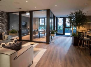 a photo of a luxury new build apartment in a city