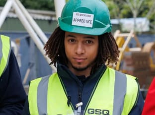 Tawona in ppe looking at the camera