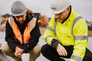 nhbc building inspector on site reviewing groundworks