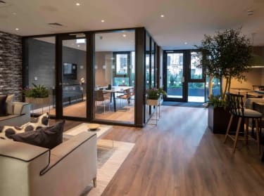 a photo of a luxury new build apartment in a city