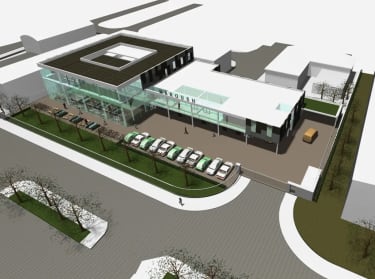 a 3D render of the proposed design for maroush food factory, showing the entire building and parking space