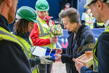 hrh the princess royal accepting gifts from bricklaying apprentices