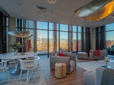 a photo of a luxury new-build apartment on a sunny day in a city