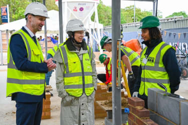 hrh the princess royal talking to a bricklaying apprentice
