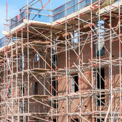 Building under construction with scaffolding