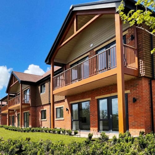 New build design with first floor balconies in the sun
