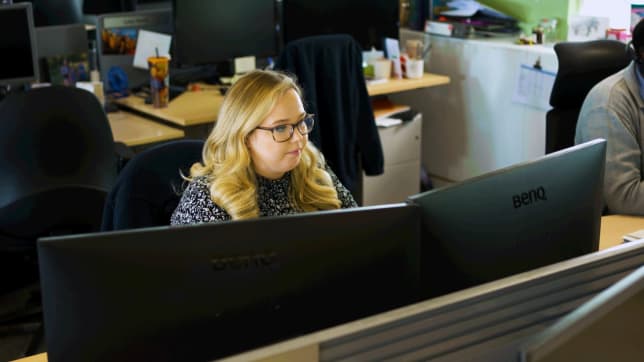 Alicia McCarthy working at her desk