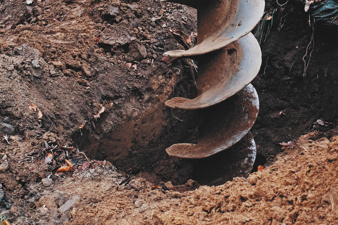 a photo of a boring machine drilling into the ground