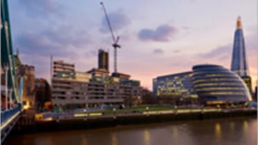 the london skyline during a sunset