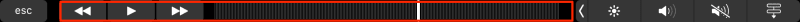 Screenshot of the Touch Bar with Music app controls highlighted