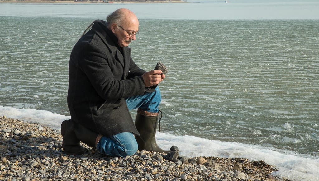 David Labbe taking photographs on the waterfront