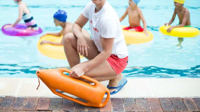 lifeguard near a pool