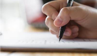 Person filling out an application