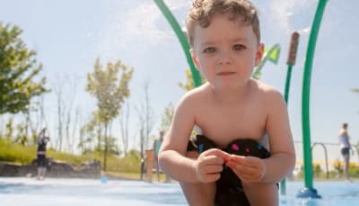 Young child at a splash pad