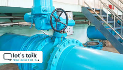 "Let's Talk" Photo of a water pipe.