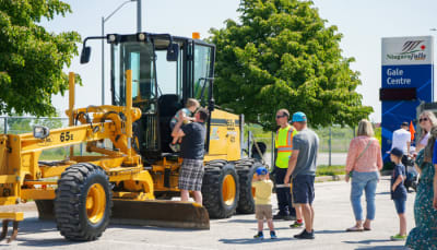 Touch-A-Truck. Graphic of trucks lined up.