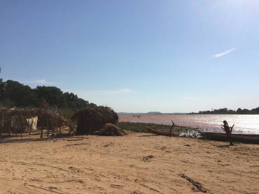 a vast brown river from the beach