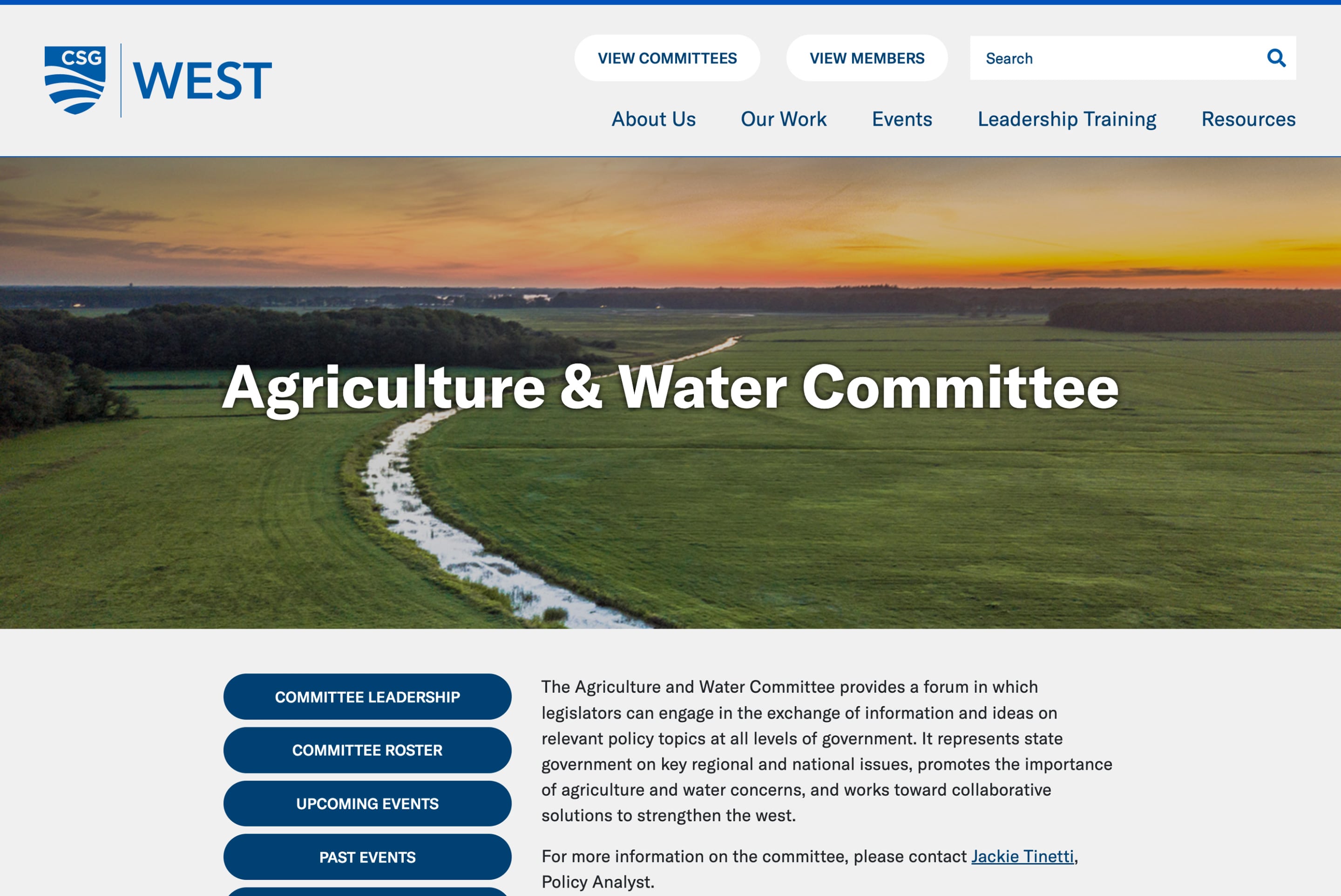 An inside page for the Agriculture and Water Comittee showing a photo of a river and green grass surrounding it