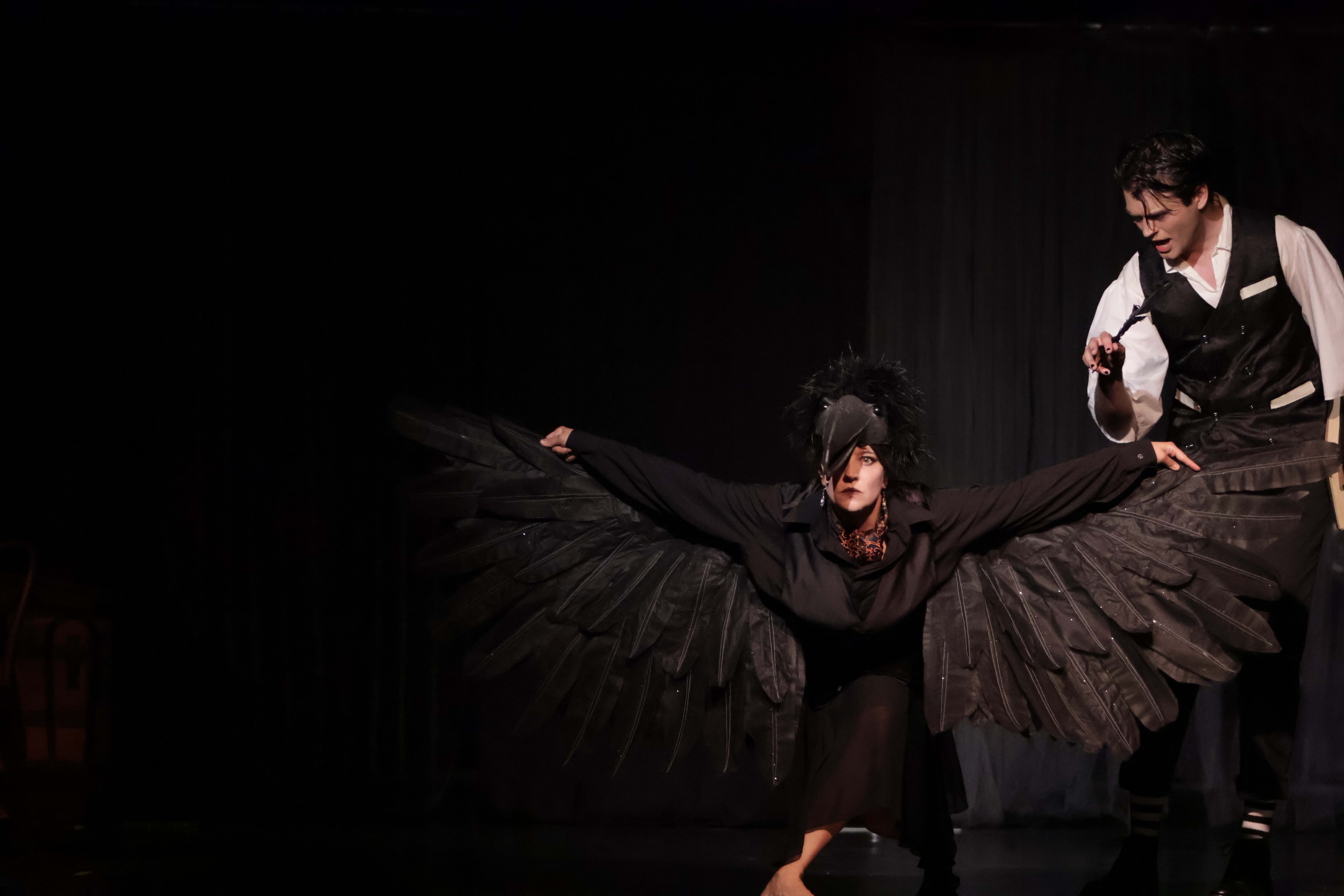 Nick as Edgar Allan Poe in Nevermore, standing with the Raven