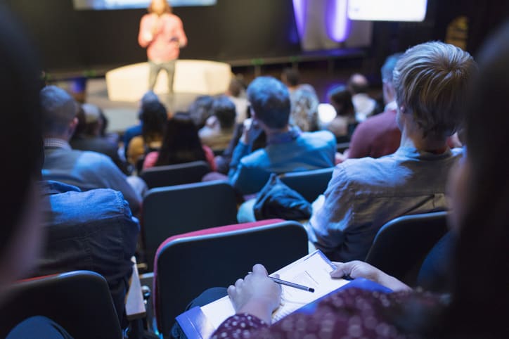 Audience taking notes