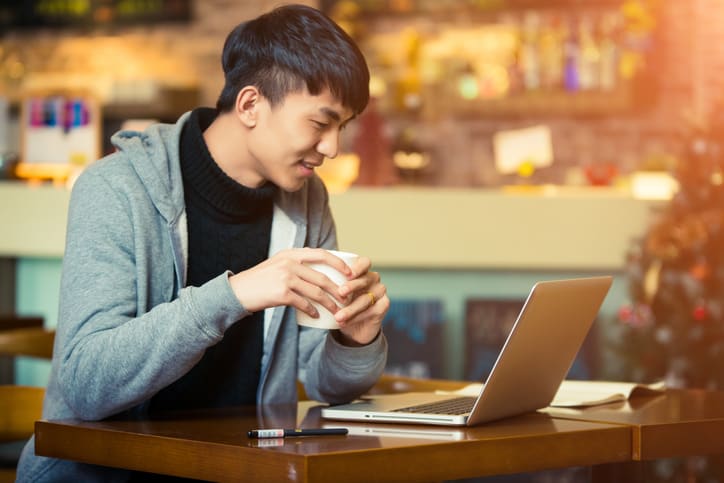 A young man in a coffee house